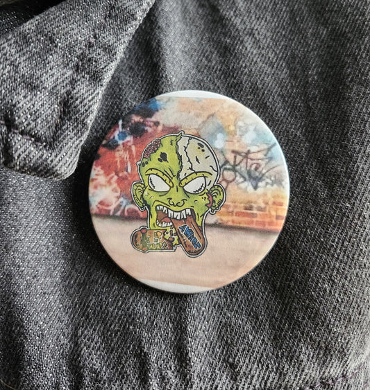 Macaron Zombie mange skate avec fond de couleur