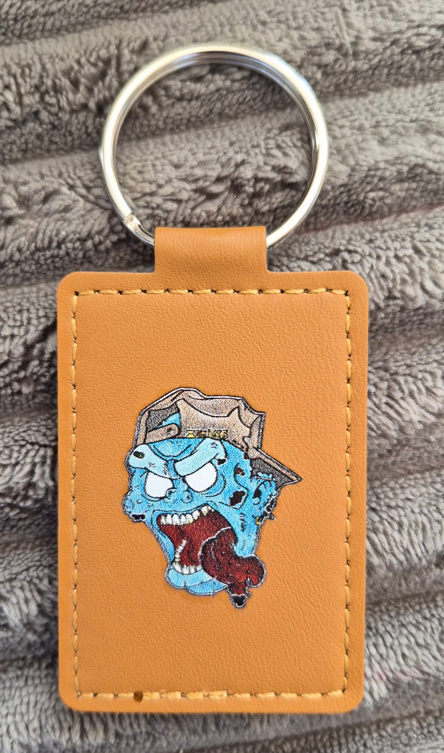 Porte clé en cuir Zombie casquette
